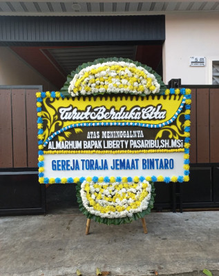 Papan Bunga Duka di Yuko